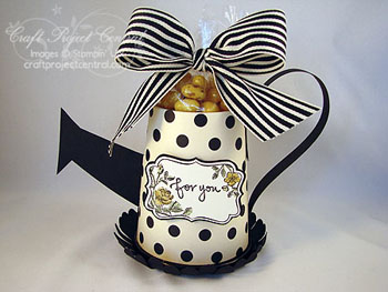 WateringCanTreatContainer